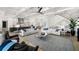 Bright, open-concept living room with coffered ceilings and stylish furnishings at 2502 S Dundee St, Tampa, FL 33629