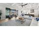 Open-concept living room with waterfront views, modern kitchen, and stylish furnishings at 2502 S Dundee St, Tampa, FL 33629