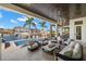 Gorgeous outdoor living space with pool and waterfront views, perfect for relaxing and entertaining at 2502 S Dundee St, Tampa, FL 33629