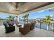 Beautiful outdoor seating area overlooking a serene waterfront, complete with comfortable seating at 2502 S Dundee St, Tampa, FL 33629