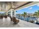 Inviting outdoor seating area with waterfront views, offering a perfect space to relax and entertain at 2502 S Dundee St, Tampa, FL 33629