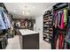 Expansive walk-in closet with custom storage solutions and central island at 2502 S Dundee St, Tampa, FL 33629