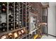 An organized wine cellar with custom wine storage with marble floors at 2502 S Dundee St, Tampa, FL 33629