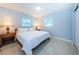 Bright bedroom with king-size bed and window at 2511 Quincy S St, St Petersburg, FL 33711