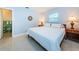 Spacious bedroom with a king-size bed and ensuite bathroom at 2511 Quincy S St, St Petersburg, FL 33711