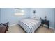 Bedroom with a full-size bed and nightstand at 2511 Quincy S St, St Petersburg, FL 33711
