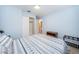 Cozy bedroom with patterned bedding and built-in closet at 2511 Quincy S St, St Petersburg, FL 33711