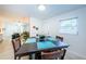 Bright dining room with a square table and four chairs at 2511 Quincy S St, St Petersburg, FL 33711