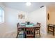 Charming dining room with table, chairs, and artwork at 2511 Quincy S St, St Petersburg, FL 33711