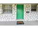 House exterior with a green door and stone facade at 2511 Quincy S St, St Petersburg, FL 33711
