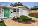 House exterior featuring a green door and stone facade at 2511 Quincy S St, St Petersburg, FL 33711