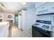 Kitchen features gas range, microwave and refrigerator at 2511 Quincy S St, St Petersburg, FL 33711