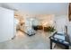 Open floor plan features a kitchen with granite countertops and island, and living room with seating at 2511 Quincy S St, St Petersburg, FL 33711