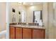 Double vanity bathroom with granite countertop and walk-in shower at 310 Summer Clouds Pl, Brandon, FL 33511