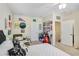 Upstairs bedroom with a view of the home's second floor hallway at 310 Summer Clouds Pl, Brandon, FL 33511
