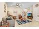 Spacious living room featuring comfortable seating and a large TV at 310 Summer Clouds Pl, Brandon, FL 33511