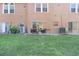 Ground level patio with seating area, adjacent to building at 310 Summer Clouds Pl, Brandon, FL 33511