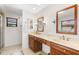 Bathroom with double vanity and ample counter space at 350 6Th N Ave, Tierra Verde, FL 33715
