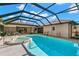 Relaxing screened-in pool and spa with open-air feel at 350 6Th N Ave, Tierra Verde, FL 33715