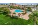 Overlooking the community pool and surrounding green space at 400 Island Way # 309, Clearwater Beach, FL 33767