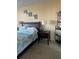 Cozy bedroom with a comfortable bed and neutral color palette at 400 Island Way # 309, Clearwater Beach, FL 33767