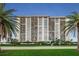 High rise building exterior, offering many windows and parking at 400 Island Way # 309, Clearwater Beach, FL 33767