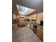Well-equipped kitchen with ample cabinetry and counter space at 400 Island Way # 309, Clearwater Beach, FL 33767
