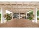 Building entrance with tiled floor and comfortable seating at 400 Island Way # 309, Clearwater Beach, FL 33767