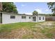 Large backyard with grassy area and shed at 4504 S Cameron Ave, Tampa, FL 33611