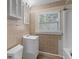 Clean bathroom with white vanity and beige tile at 4504 S Cameron Ave, Tampa, FL 33611