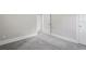 Spacious bedroom with grey carpet and neutral walls at 4504 S Cameron Ave, Tampa, FL 33611