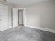 Spacious bedroom with neutral walls and carpet at 4504 S Cameron Ave, Tampa, FL 33611