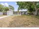 Ranch style home with attached garage and mature landscaping at 4504 S Cameron Ave, Tampa, FL 33611