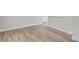 Light wood laminate flooring in a living area at 4504 S Cameron Ave, Tampa, FL 33611
