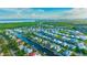 Aerial view of waterfront community with luxury homes and lush landscaping at 615 Mirabay Blvd, Apollo Beach, FL 33572