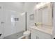 Clean bathroom with white subway tiles, a glass shower, and a modern vanity at 615 Mirabay Blvd, Apollo Beach, FL 33572