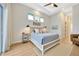 Main bedroom with light walls and comfortable bedding at 615 Mirabay Blvd, Apollo Beach, FL 33572