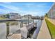 Private boat dock with lift and walkway at 615 Mirabay Blvd, Apollo Beach, FL 33572