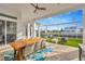 Relaxing outdoor patio with seating, a table, and water views at 615 Mirabay Blvd, Apollo Beach, FL 33572