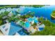 Resort-style pool area with multiple pools, a spa, and a lighthouse feature at 615 Mirabay Blvd, Apollo Beach, FL 33572