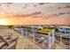 Relaxing rooftop deck overlooking the waterfront at sunset at 615 Mirabay Blvd, Apollo Beach, FL 33572