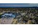 Panoramic aerial view of the neighborhood with the community center and beach in the distance at 6254 Pershing Ne St, St Petersburg, FL 33702