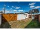 A fenced backyard offers privacy and space for outdoor activities, including a pool at 6254 Pershing Ne St, St Petersburg, FL 33702