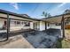 View of a large carport attached to a white home at 6254 Pershing Ne St, St Petersburg, FL 33702