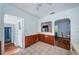 Cozy dining area with a partial wall, arched doorways, and tile flooring, adding character to the space at 6254 Pershing Ne St, St Petersburg, FL 33702