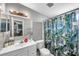Bright bathroom with updated vanity and shower at 652 13Th S Ave, St Petersburg, FL 33701