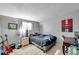 Bedroom with a double bed, desk, and musical instruments at 652 13Th S Ave, St Petersburg, FL 33701