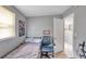 Simple bedroom with a twin bed and chair at 652 13Th S Ave, St Petersburg, FL 33701