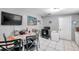 Kitchen with a round table and chairs, and a stove at 652 13Th S Ave, St Petersburg, FL 33701