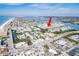 Aerial view of property near beach, highlighting canal-side location at 657 Garland Cir, Indian Rocks Beach, FL 33785